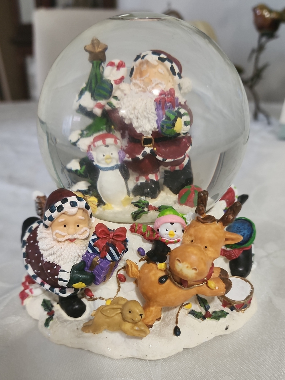 Festive Santa and Reindeer Holiday Snow Globe - Multicolor